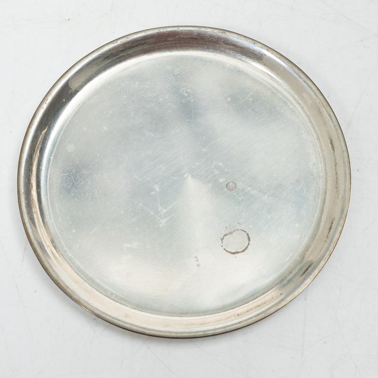 Eight coasters, silver 900, 20th century.