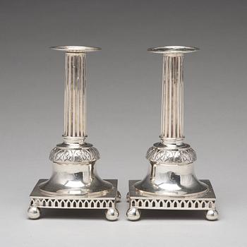 A pair of Swedish aerly 19th century silver candlesticks, mark of Carl Gustaf Blomborg, Stockholm 1815.