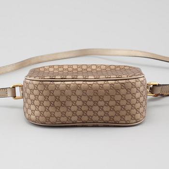 GUCCI, a "Sunshine Camera" bag.