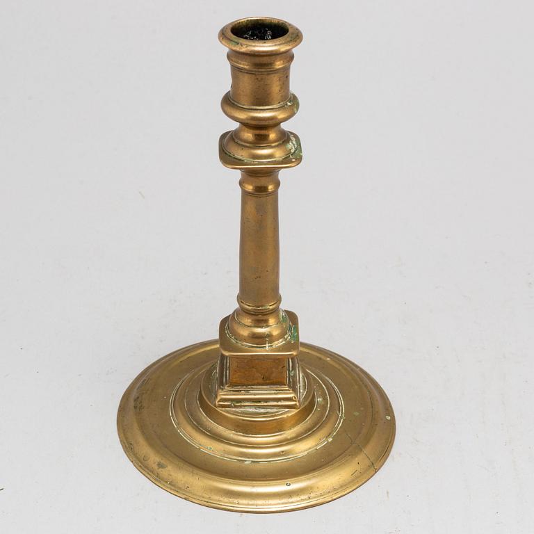 A French late 16th century bronze candlestick.