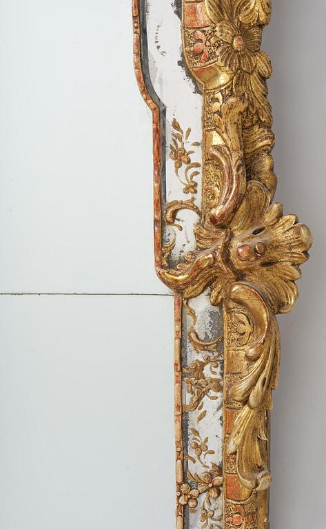 A rococo giltwood mirror attributed to N. Meunier (master in Stockholm 1754-97).