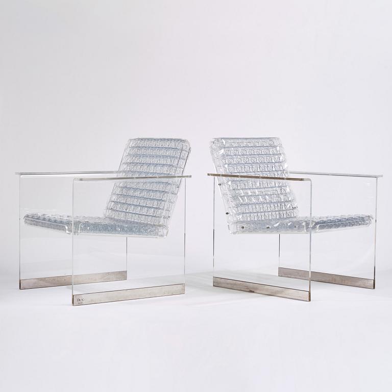 Arne Rickardt, a pair of "Pascal" armchairs, ed. 027, Dux, post 2002.