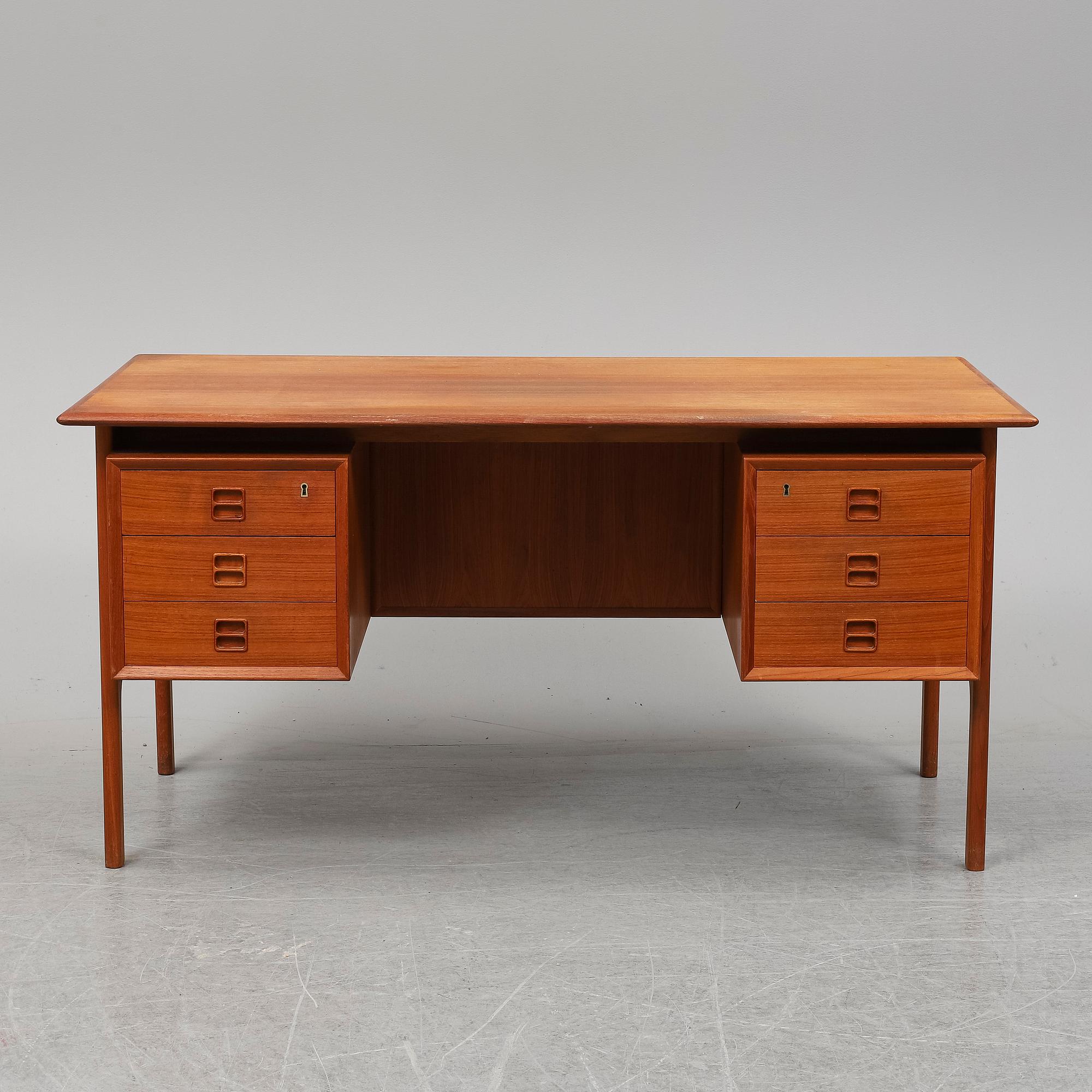 ARNE VODDER, a 1960's teak desk.
