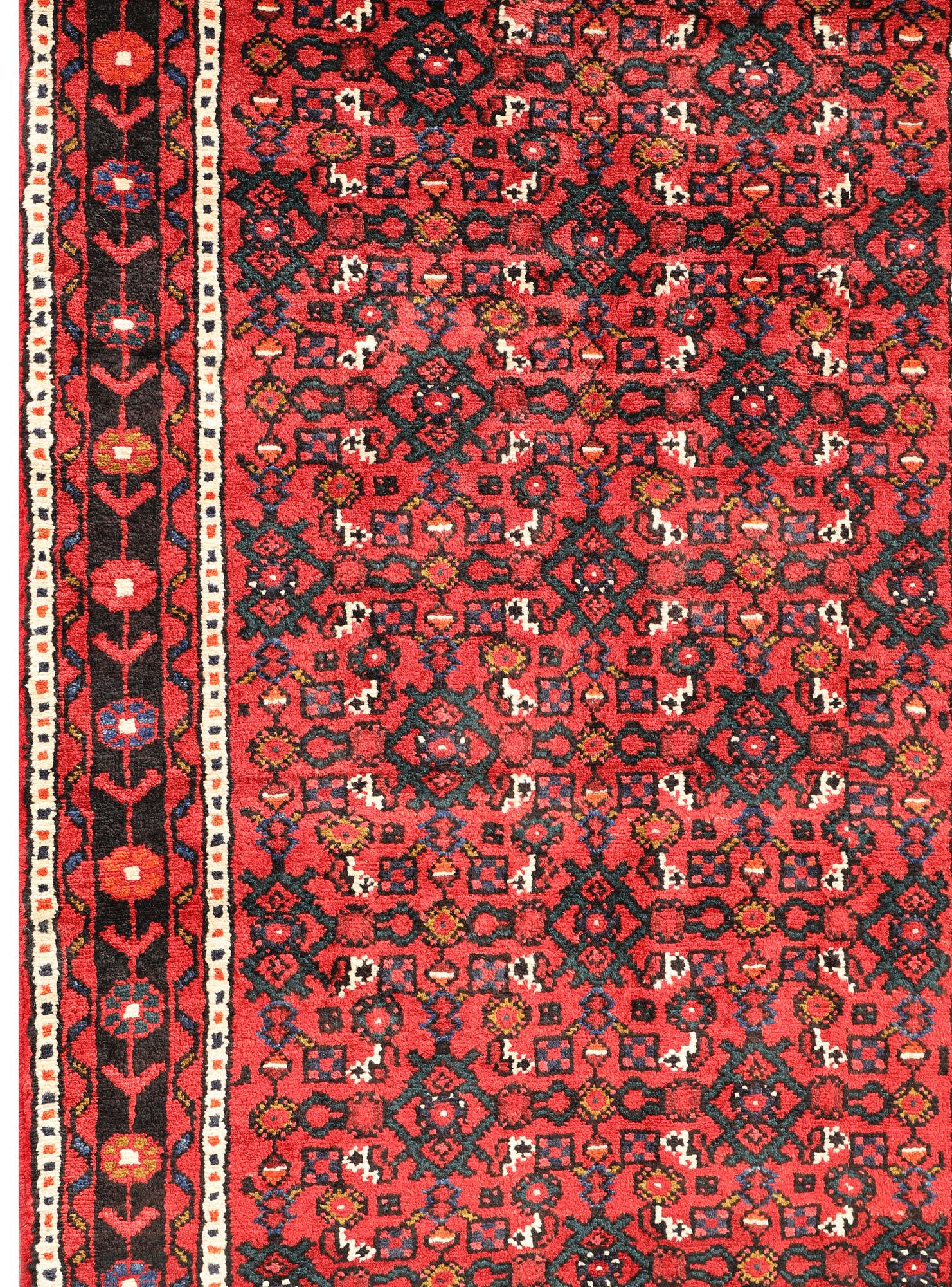 A Hosseinabad runner, c 414 x 95 cm.