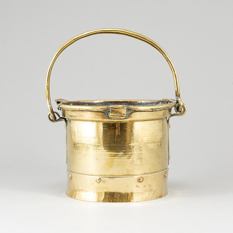 An 18th century brass brazier.