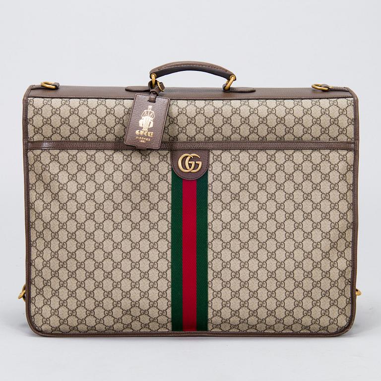 Gucci, a 'Savoy' garment bag.