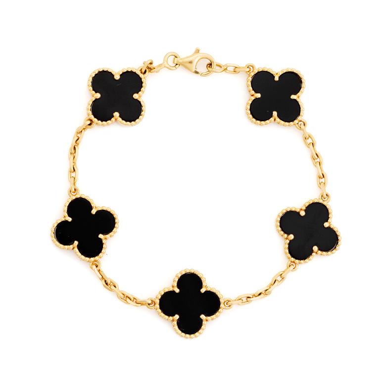 A Van Cleef & Arpels "Alhambra" bracelet in 18K gold and onyx.