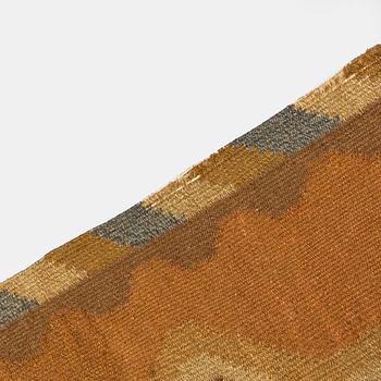Aino Keinänen-Baeckmann, A 1920s Finnish flat weave carpet. Circa 300 x 203 cm.