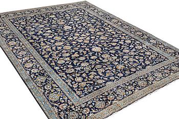 A Kashan carpet, c. 397 x 298 cm.