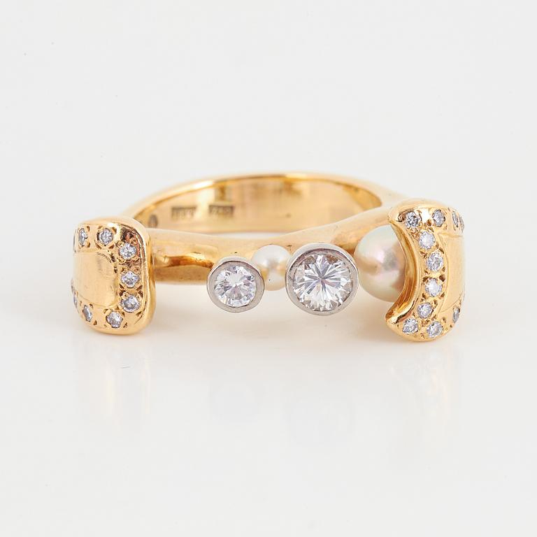 Brilliant-cut diamond and pearl ring.
