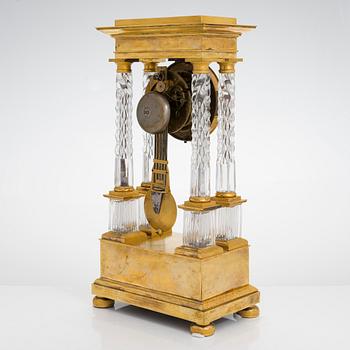 A french late Empire mantelpiece clock, first half of the 19th century.