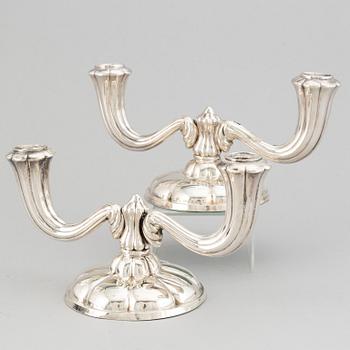 A pair of silver candelabra, Germany, with marks Copenhagen 1945.