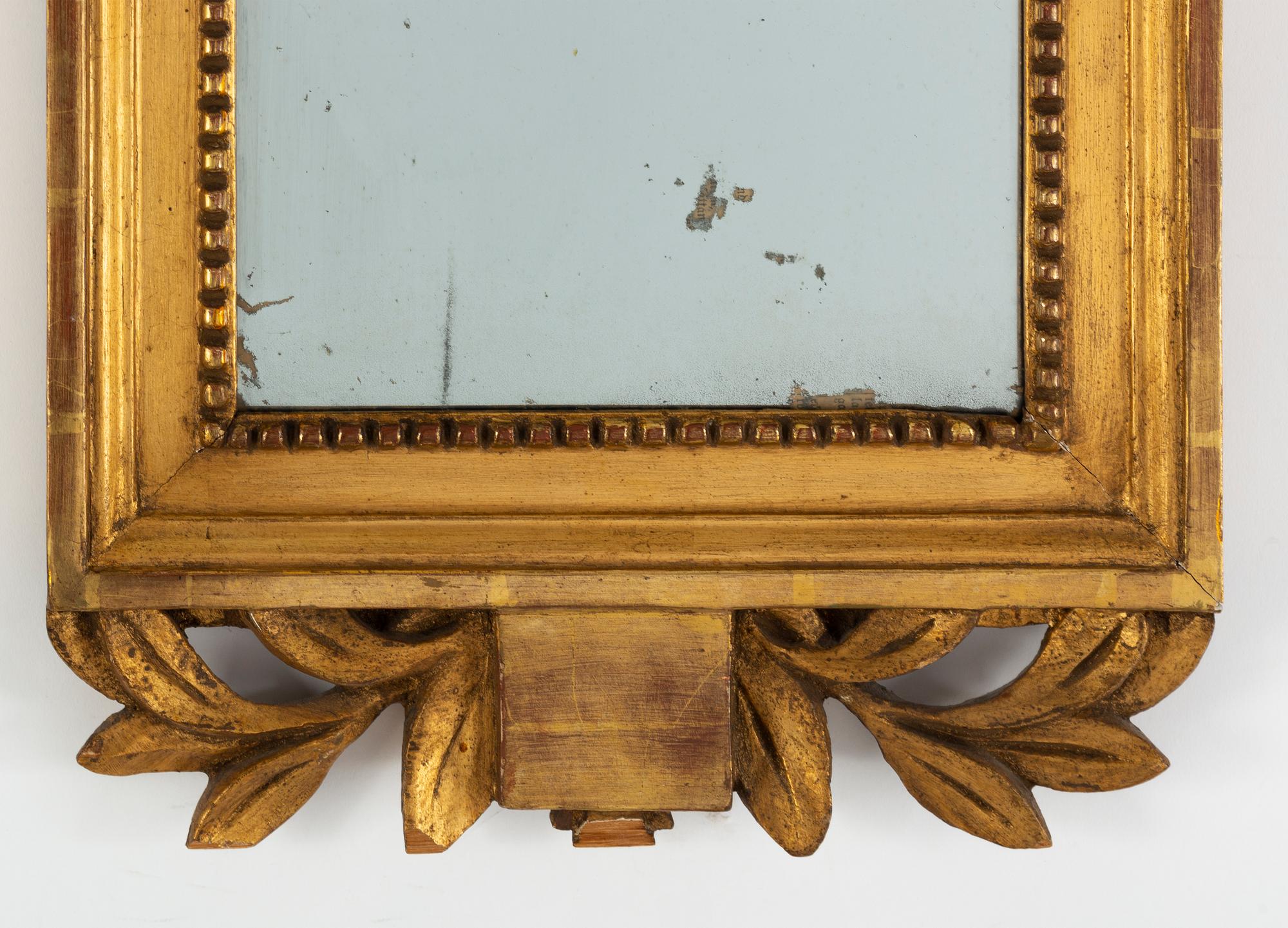A late Gustavian gilt mirror, early 19th century,