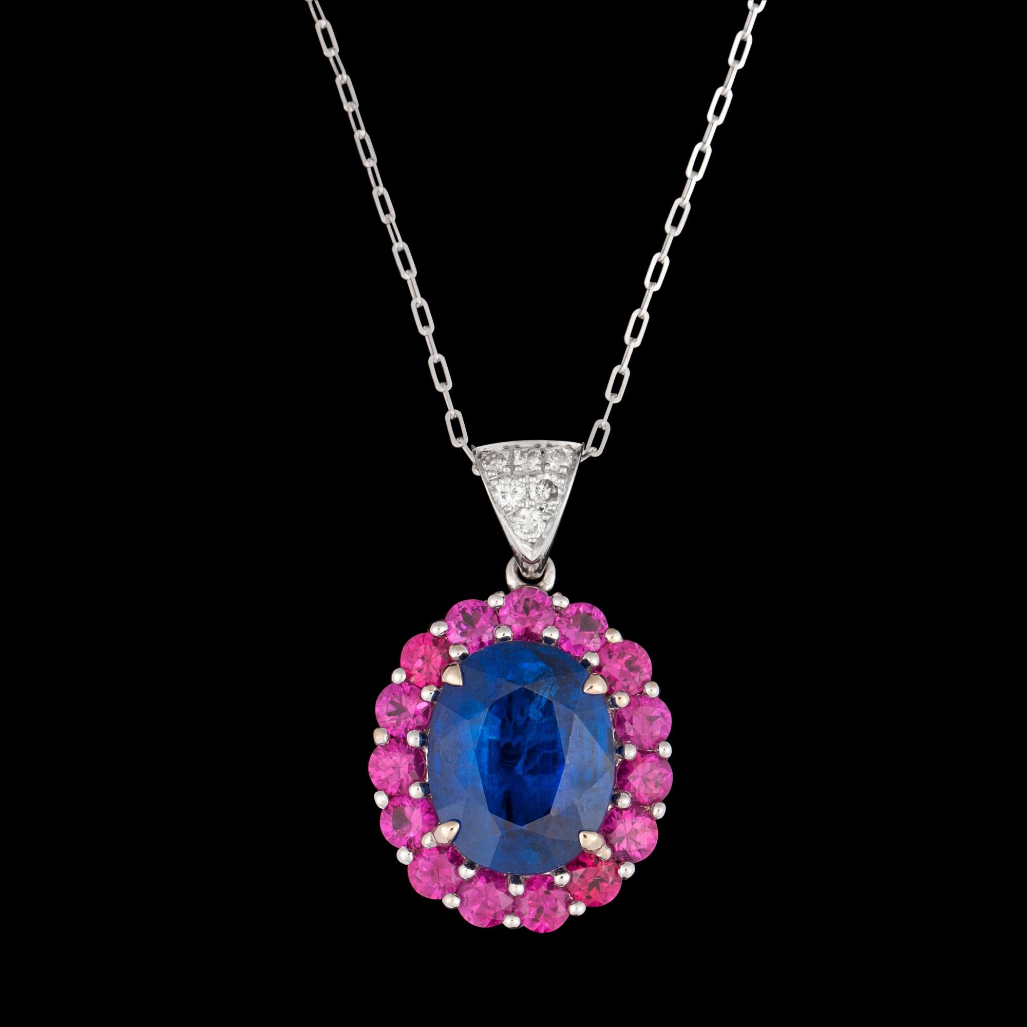 A blue kyanite, 5.70 cts, rubies, tot. 1.93 cts, and brilliant cut diamond pendant, tot. 0.13 cts.