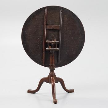 A mahogany fording table, 19th Century.