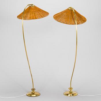 A pair of mid-20th century floor lamps.