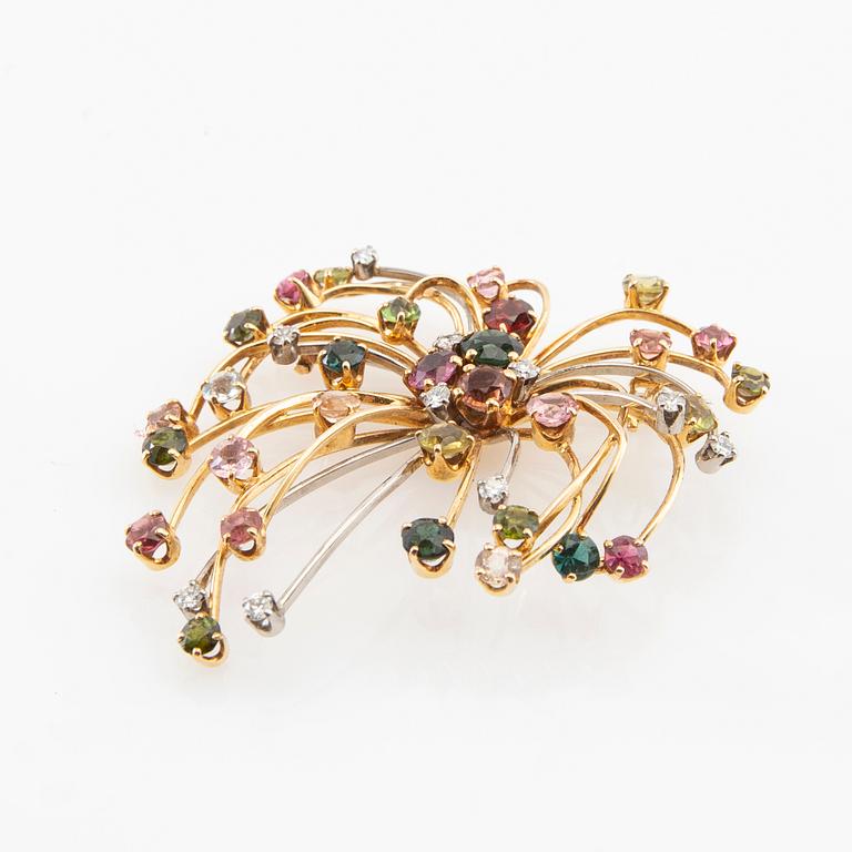 CF Carlman, Brooch 18K gold set with round brilliant-cut diamonds and faceted gemstones, Stockholm 1955.