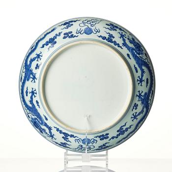 A blue and white 'dragon' dish, Qing dynasty, 18th century.