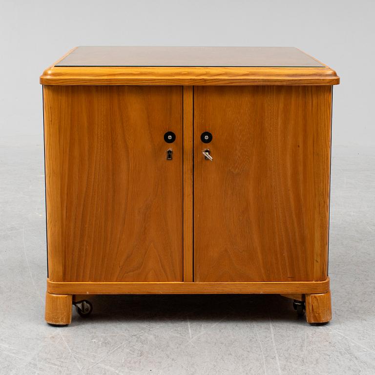 A 1930s bar table.