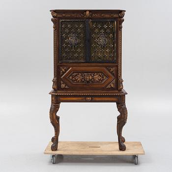 A Baroque style drinks cabinet, first half of the 20th Century.