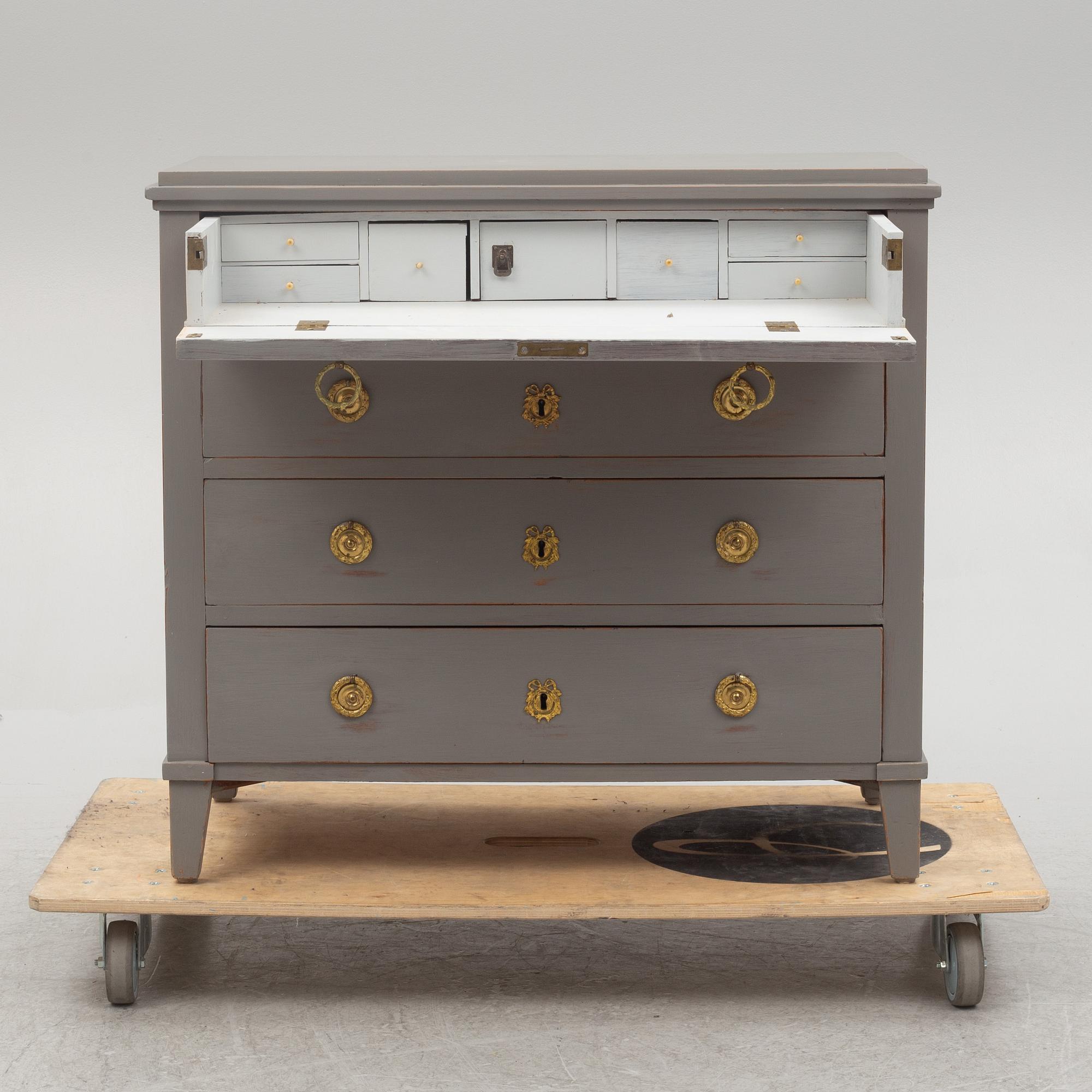 A Gustavian style chest of drawers, early 20th century.