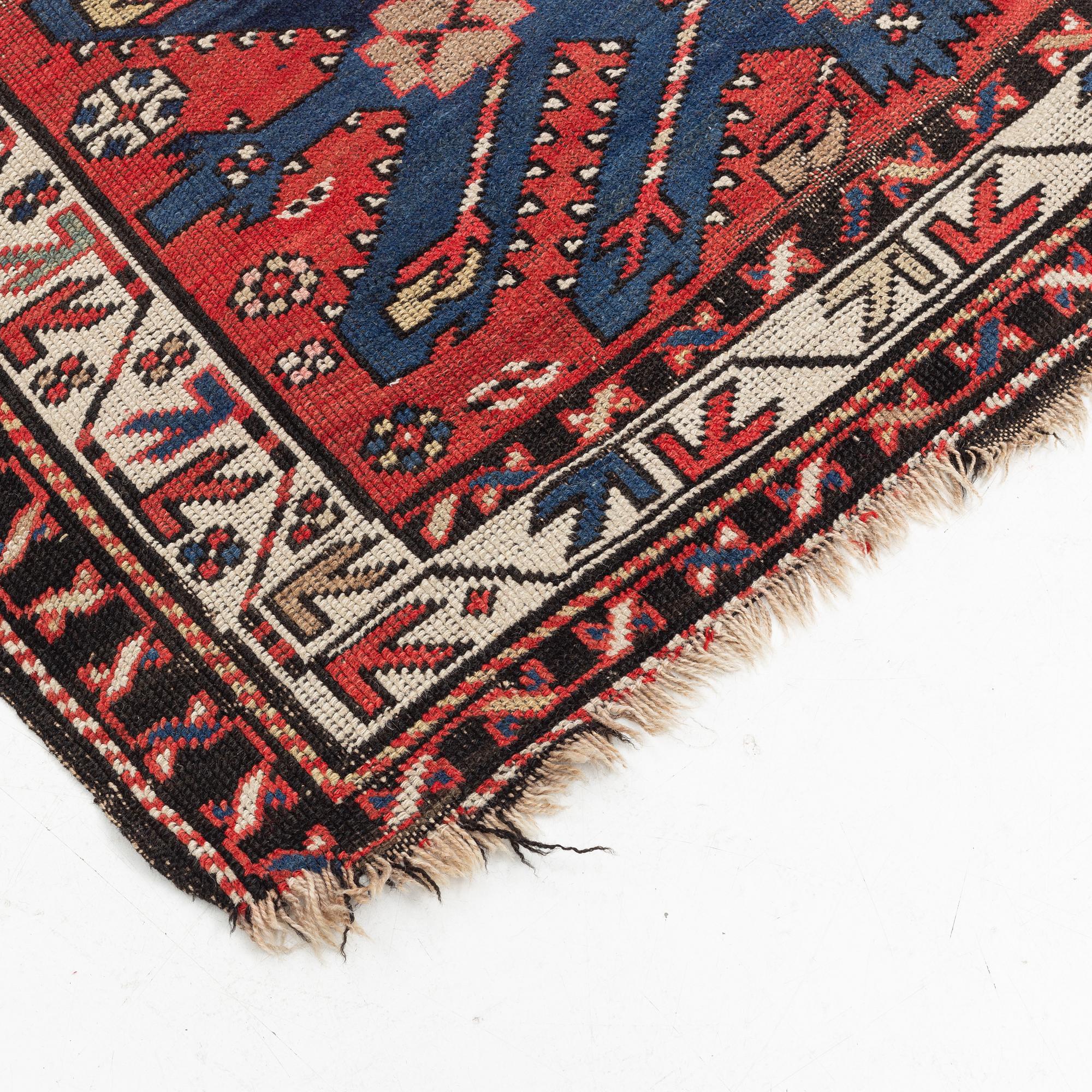 Rug, "Sunburst", Kazak, circa 250 x 137 cm.
