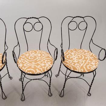 A set of four Grytgöl metal garden chairs mid 1900s.