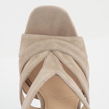 Prada, a pair of beige suede sandals, size 37.