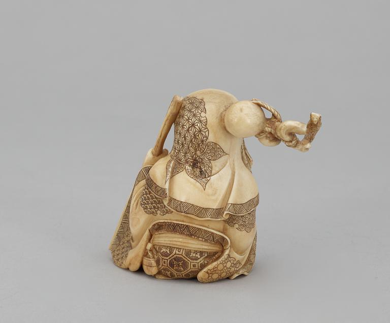 A Japanese ivory okimono figure of Sholaou, Meiji period.