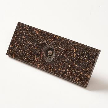 An Empire 'Blyberg' porphyry paper weight, first part of the 19th century.