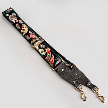 A Valentino strap.