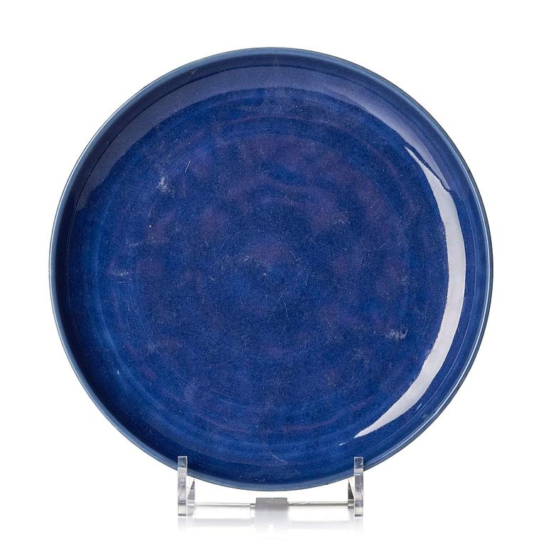 A blue glazed dish, Qing dynasty with an apocryphal four character mark of Chenghua.