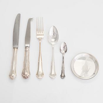A 21-piece set of 'Chippendale' silver cutlery, and 11 silver coaster, Turku and Hämeenlinna, 1983-90 and 1964.
