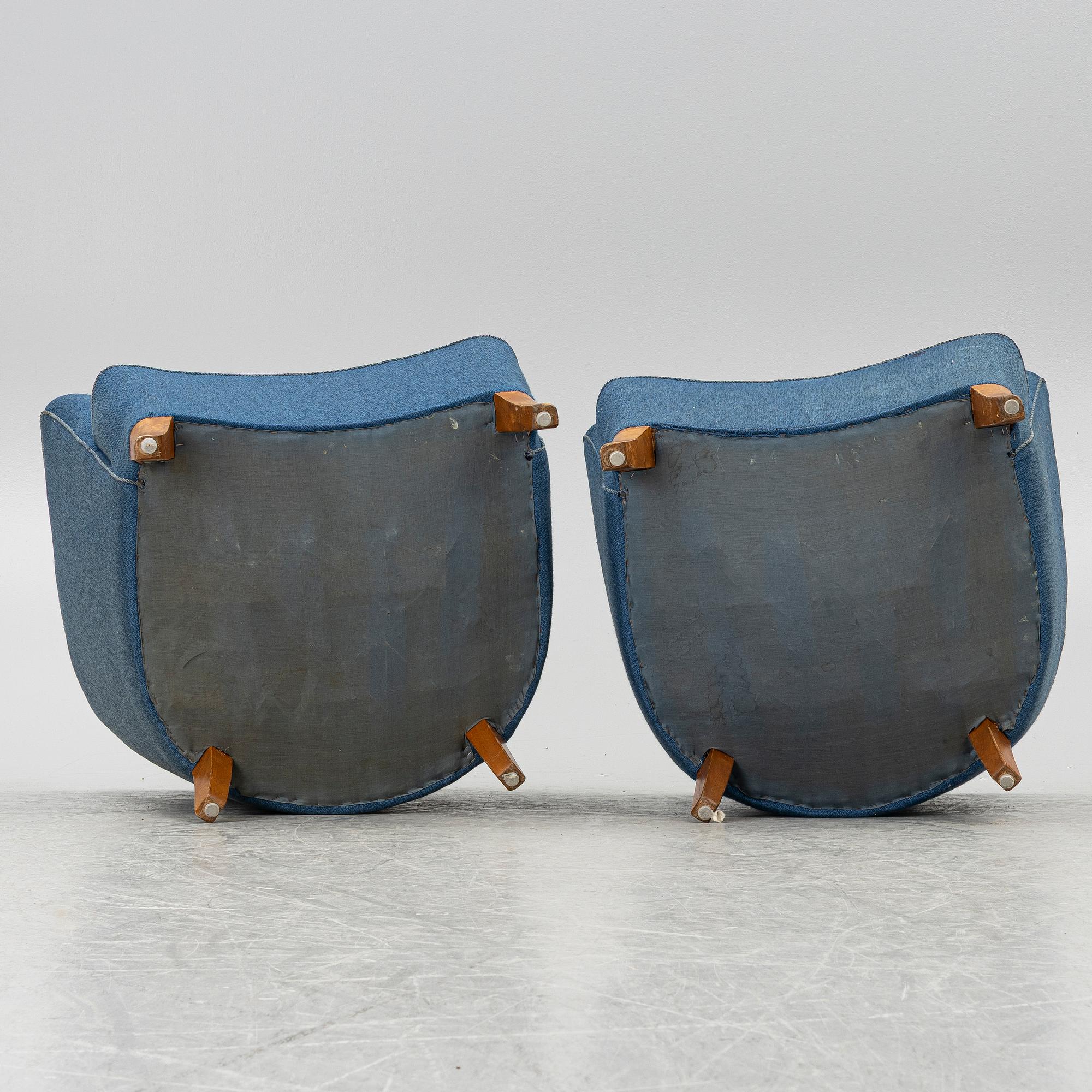 A pair of 1950's armchairs.