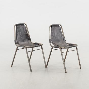 A COUPLE OF CHAIRS.