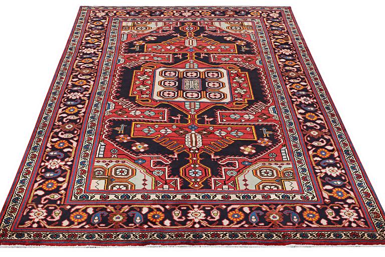 A carpet, Bakhtiari, c. 306 x 215 cm.