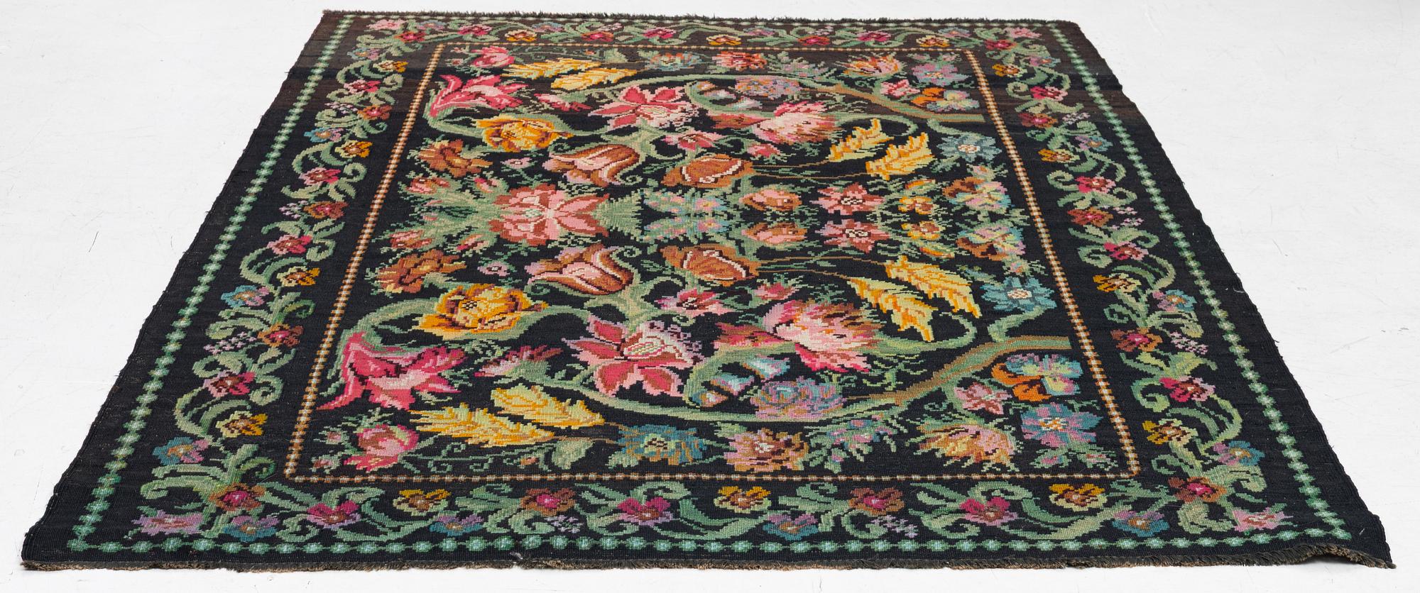 A Bessarabian kilim rug, c. 240 x 170 cm.