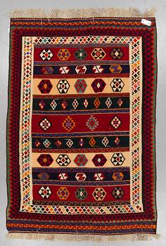 A CARPET, Persian kilim, ca 240 x 167 cm.