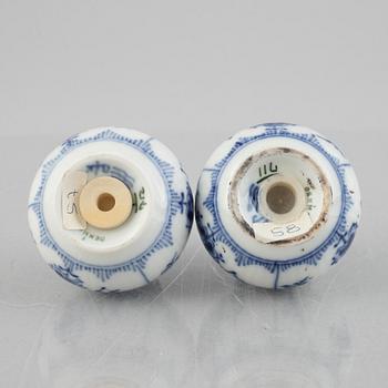 A 'Blue Fluted Half Lace' porcelain salt- and pepper shaker, Royal Copenhagen, model 711 and 712, post 1923.