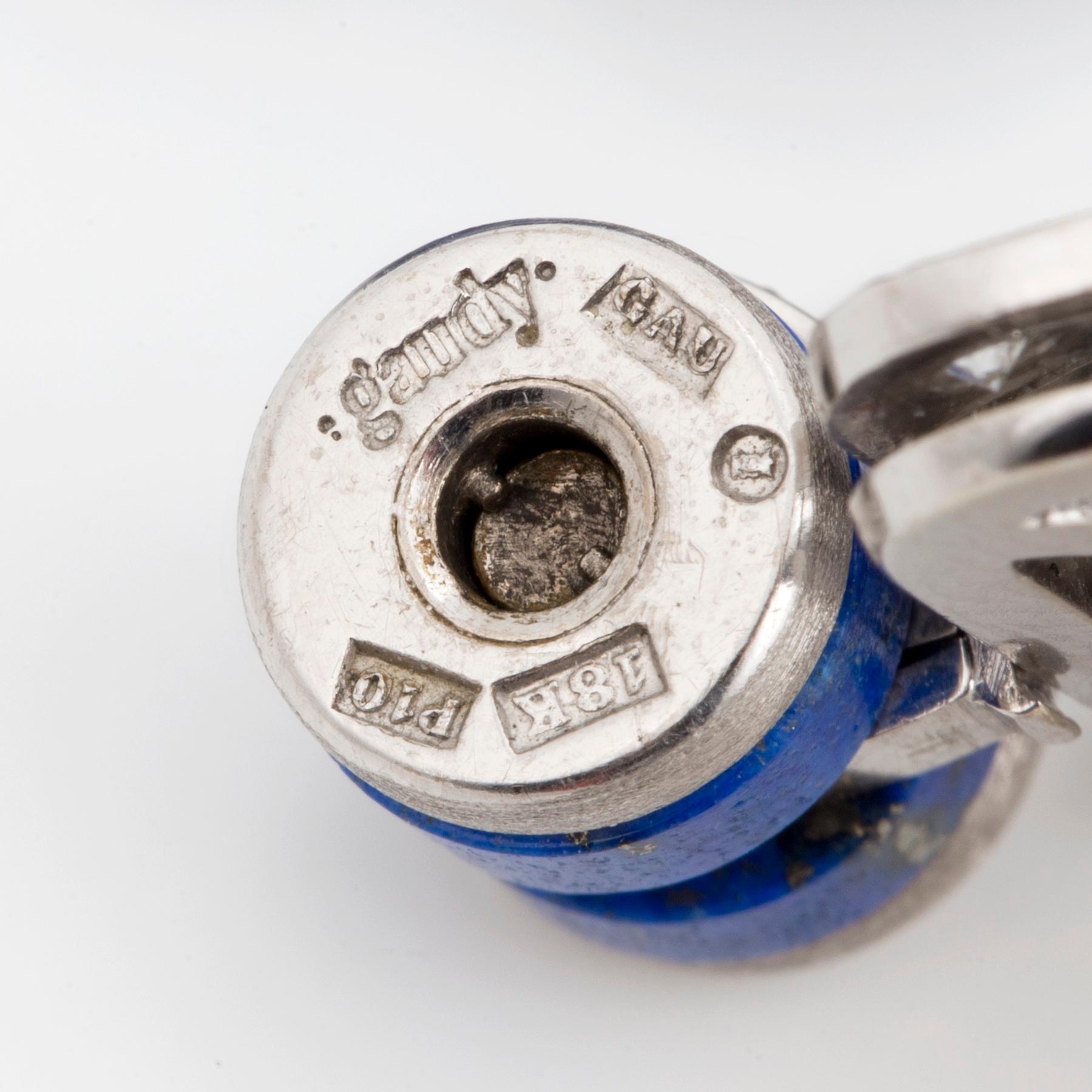 A Gaudy clasp and two necklaces.