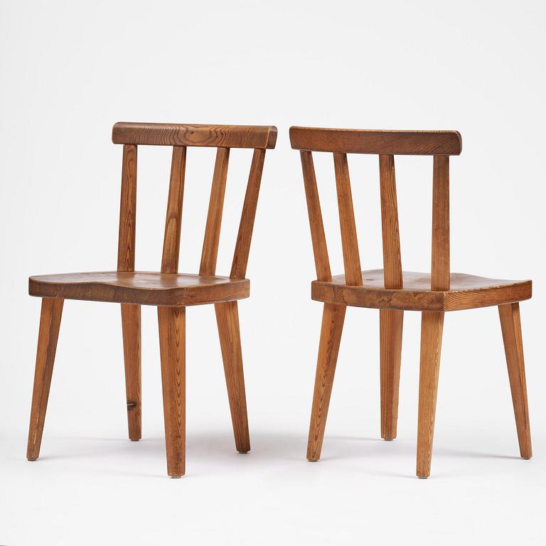 Axel Einar Hjorth, a set of six stained pine "Utö" chairs, Nordiska Kompaniet, Sweden, 1930s.