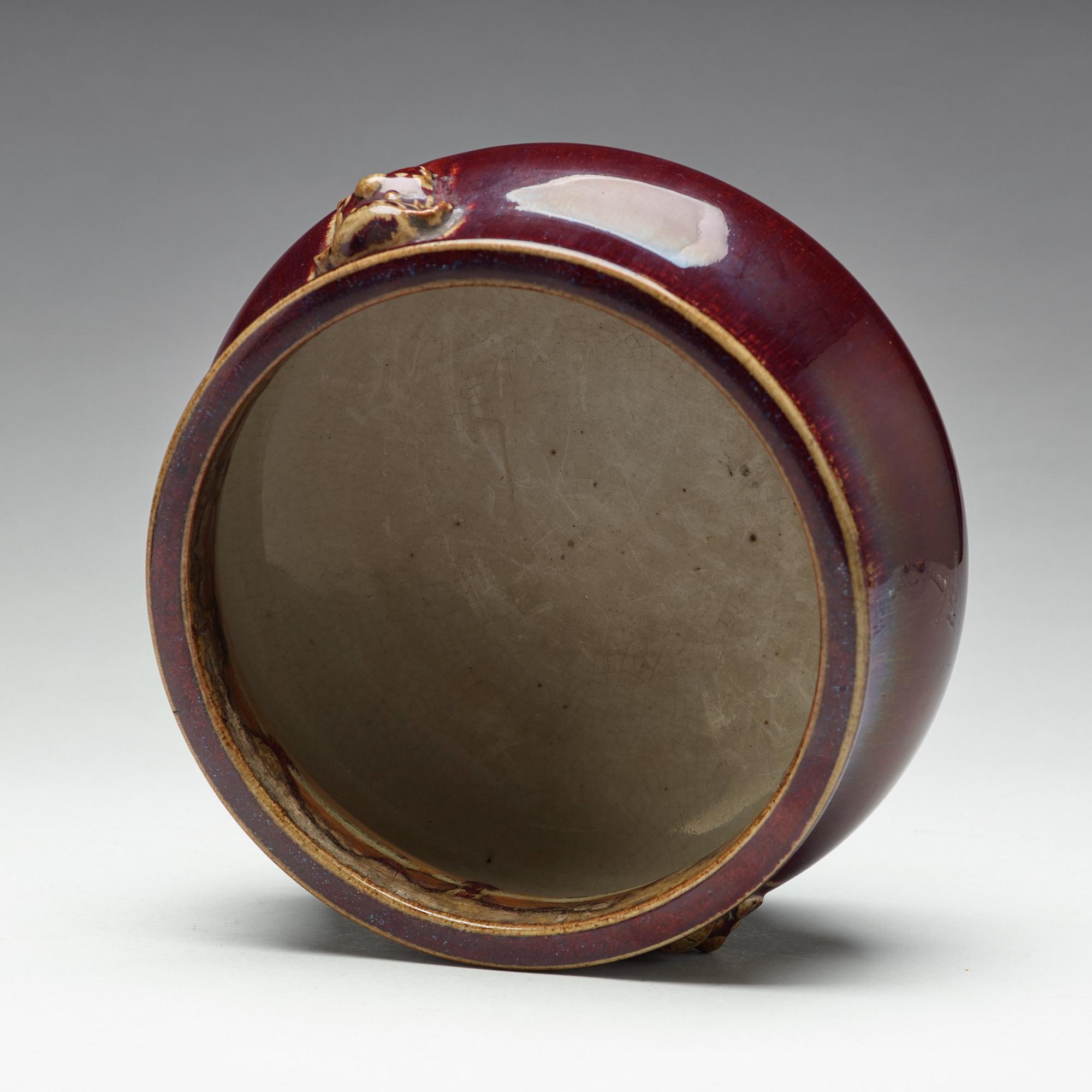 A 'sang de boef' glazed censer, Qing dynasty, 19th century.