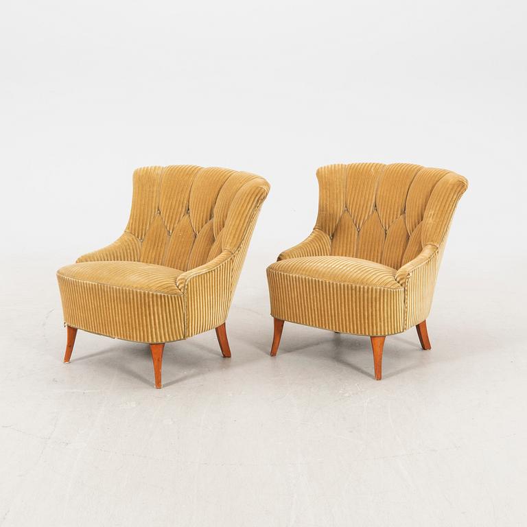 A pair of 1940/50s easy chairs.