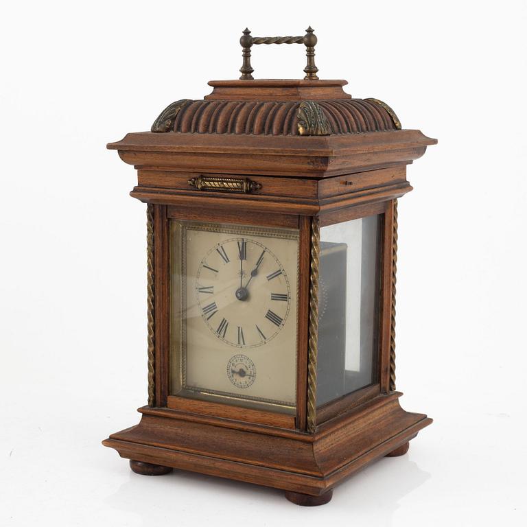 A mantle clock with a polyphon music box, around 1900.