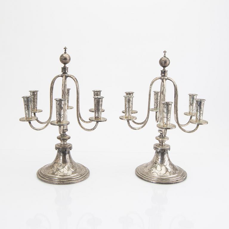 A Swedish 20th century pair of silver candelabras mark of CG Hallberg Stockholm 1928 possibly Elis Bergh.