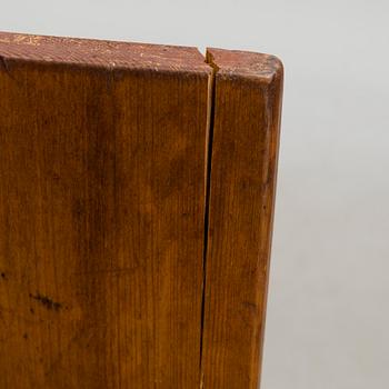 A 19th century folk art drop leaf table.