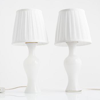 A pair of similar glass table lights from Lindshammars glasbruk, probably designed by Gunnar Ander.
