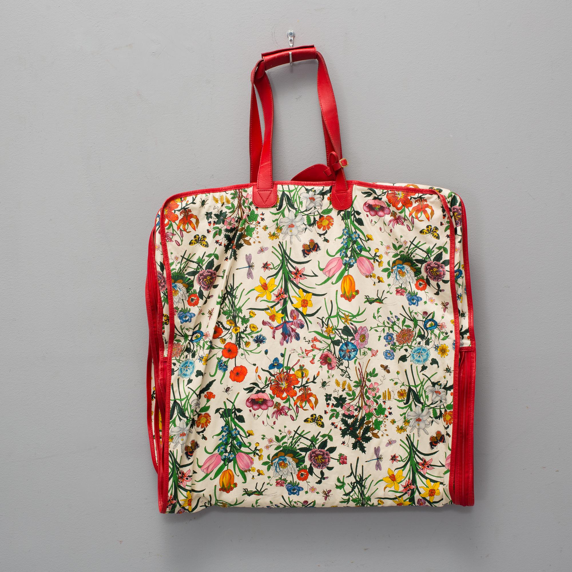 GUCCI, a 'Flora' garment bag.