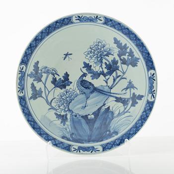 A blue and white Chinese dish, around 1900.