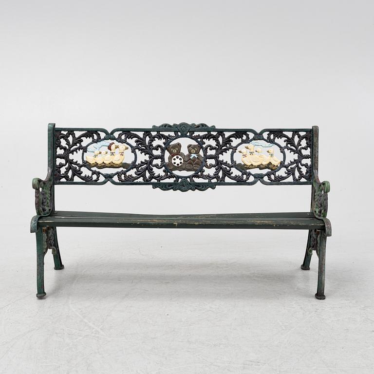 A children's cast iron garden sofa and armchair, mid 20th century.